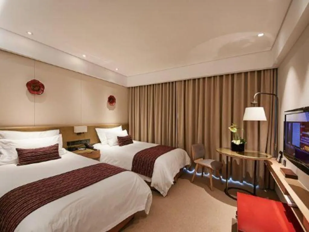 Bed in New Century Kylie Hotel Ningbo