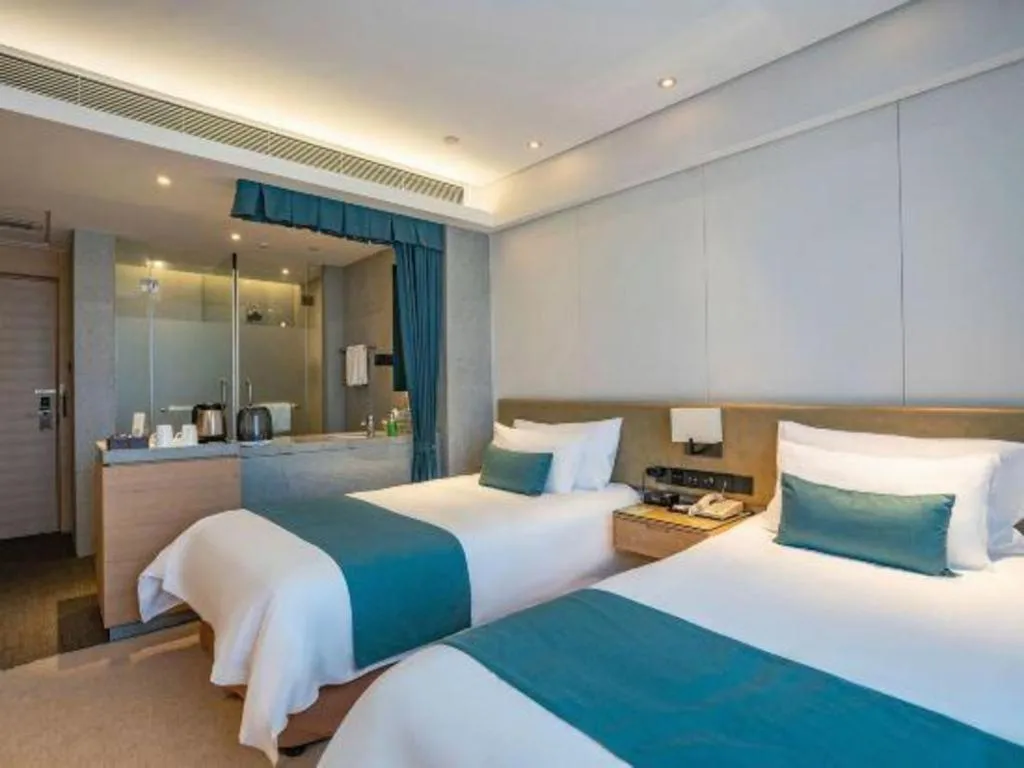 Bed in New Century Kylie Hotel Ningbo