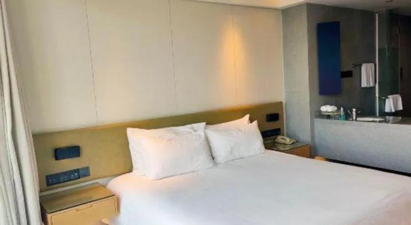 Bed in New Century Kylie Hotel Ningbo
