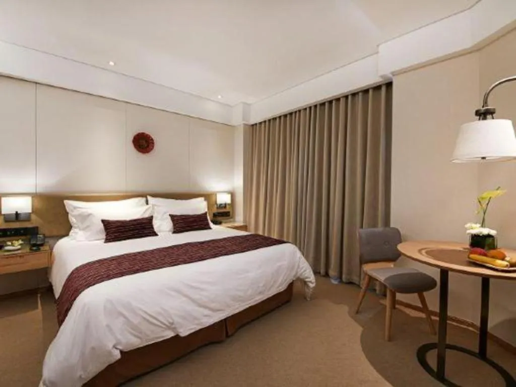 Bed in New Century Kylie Hotel Ningbo