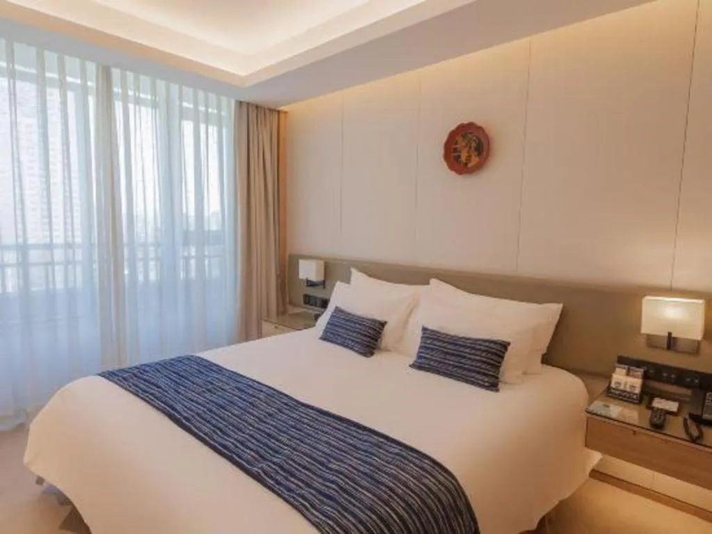 Bed in New Century Kylie Hotel Ningbo