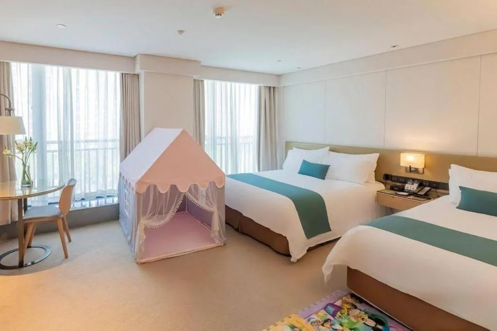 Bed in New Century Kylie Hotel Ningbo