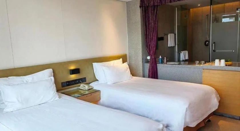 Bed in New Century Kylie Hotel Ningbo