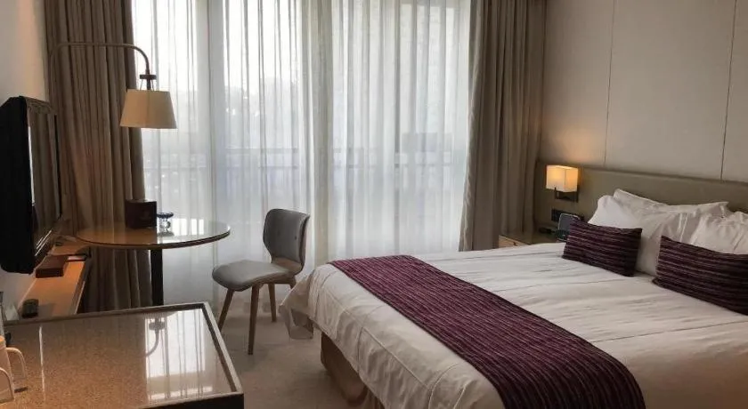Bed in New Century Kylie Hotel Ningbo
