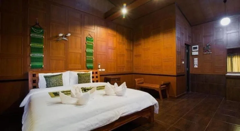 Bed in Baan Baitan Resort