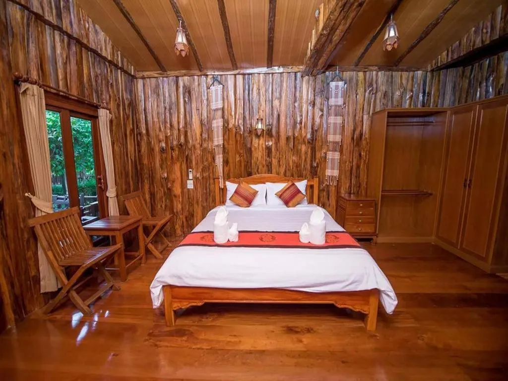 Bed in Baan Baitan Resort