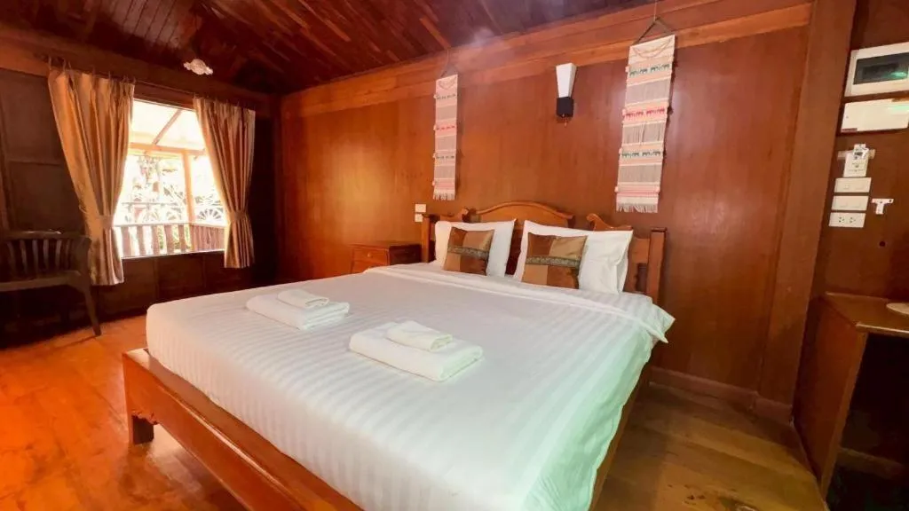Bed in Baan Baitan Resort