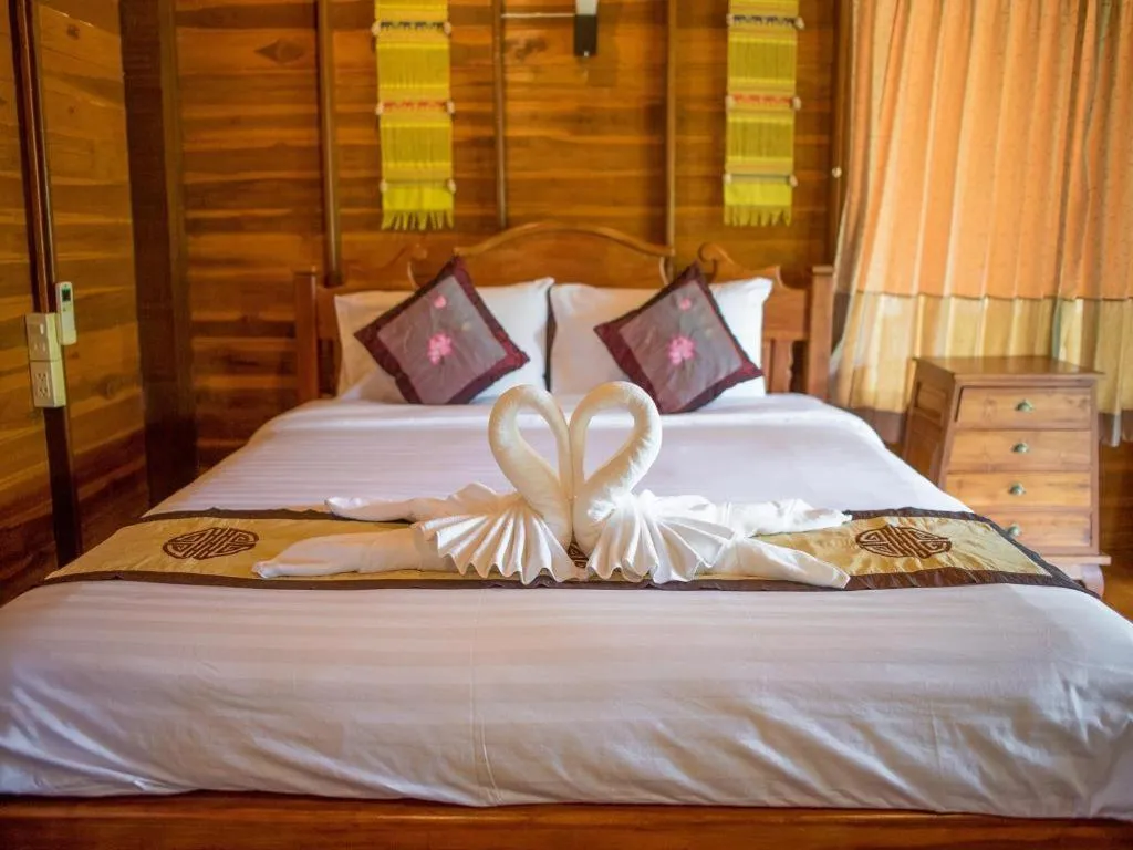 Bed in Baan Baitan Resort