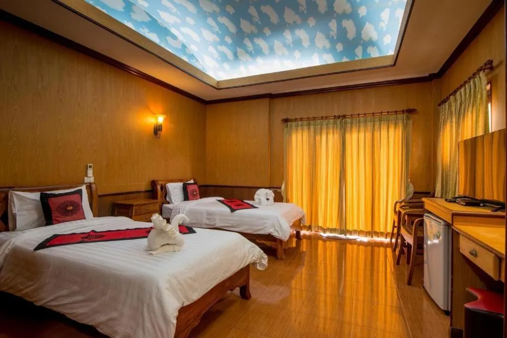 Bed in Baan Baitan Resort