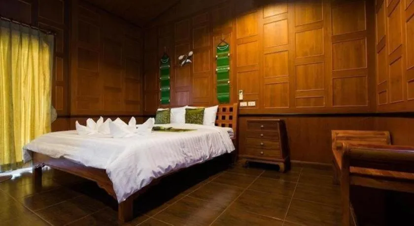Bed in Baan Baitan Resort