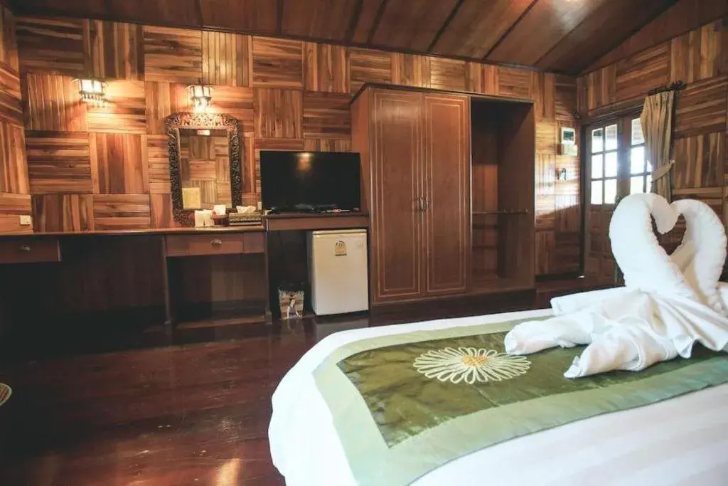 Bed in Baan Baitan Resort Bed in Baan Baitan Resort