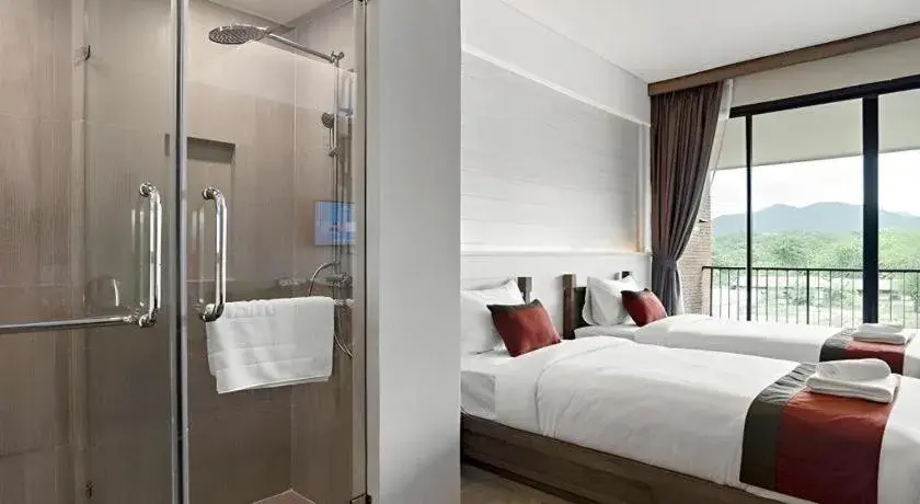 Bed in B2 Mae Hong Son Premier Hotel Bed in B2 Mae Hong Son Premier Hotel