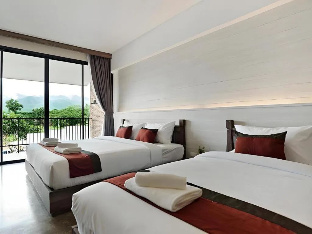 Bed in B2 Mae Hong Son Premier Hotel