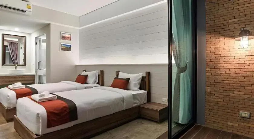 Bed in B2 Mae Hong Son Premier Hotel Bed in B2 Mae Hong Son Premier Hotel