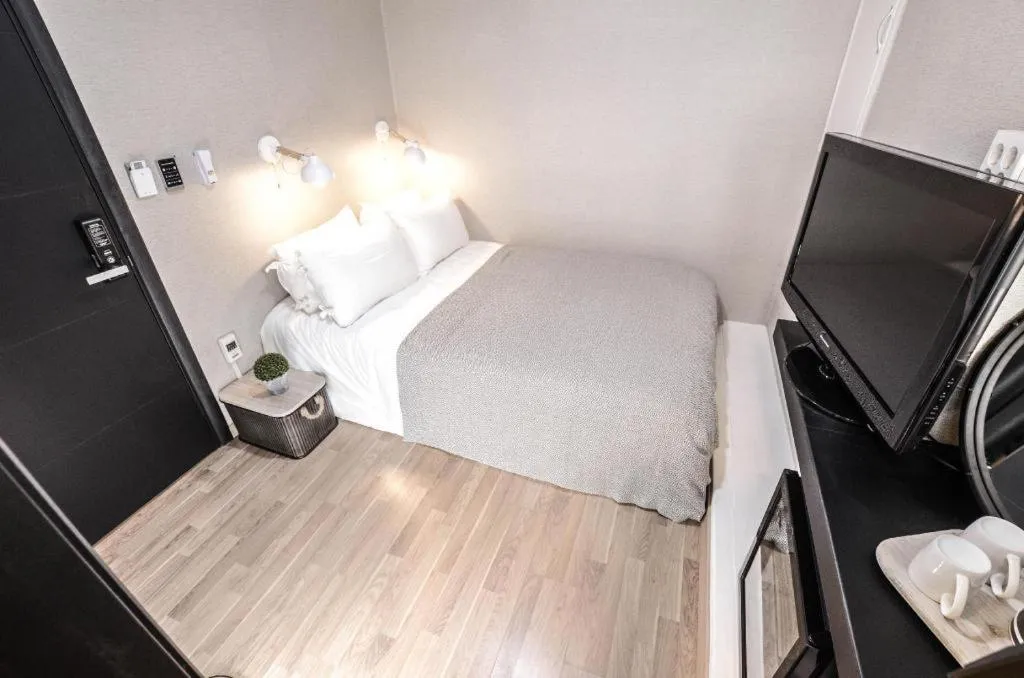 Bed in Mmmio II Design Residence Myeongdong