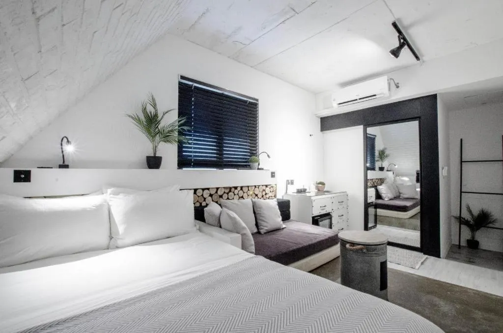Bed in Mmmio II Design Residence Myeongdong
