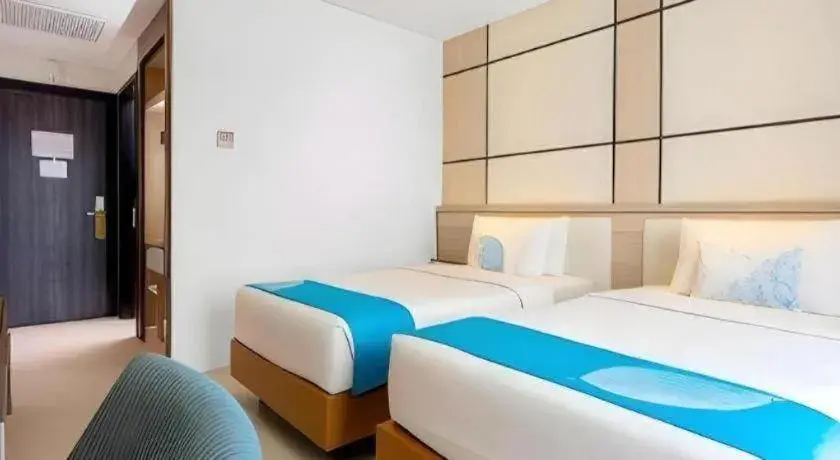 Bed in Java Lotus Hotel Jember Bed in Java Lotus Hotel Jember