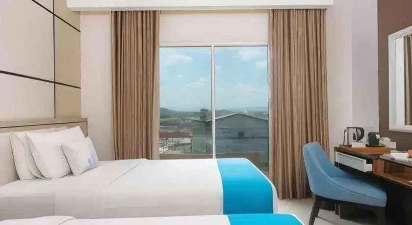 Bed in Java Lotus Hotel Jember Bed in Java Lotus Hotel Jember