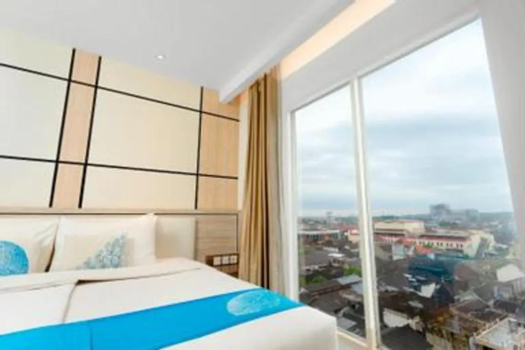 Bed in Java Lotus Hotel Jember