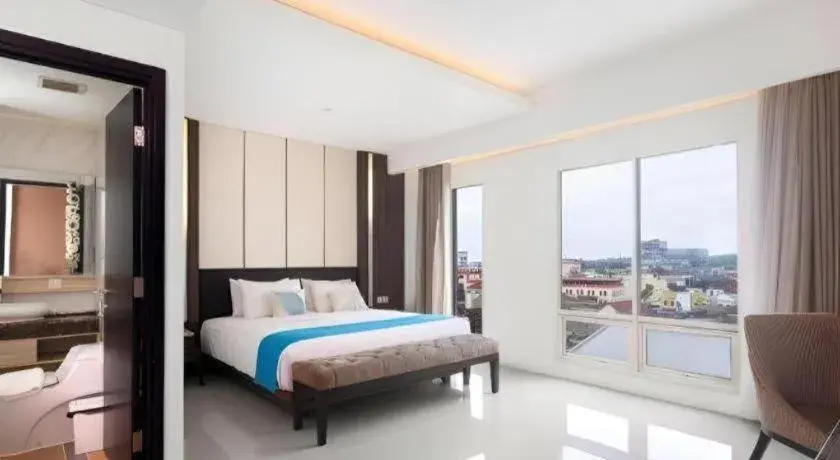 Bed in Java Lotus Hotel Jember Bed in Java Lotus Hotel Jember