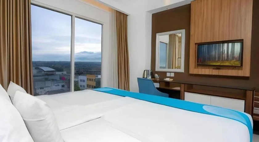 Bed in Java Lotus Hotel Jember