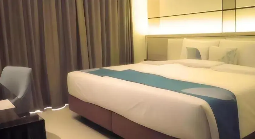 Bed in Java Lotus Hotel Jember Bed in Java Lotus Hotel Jember