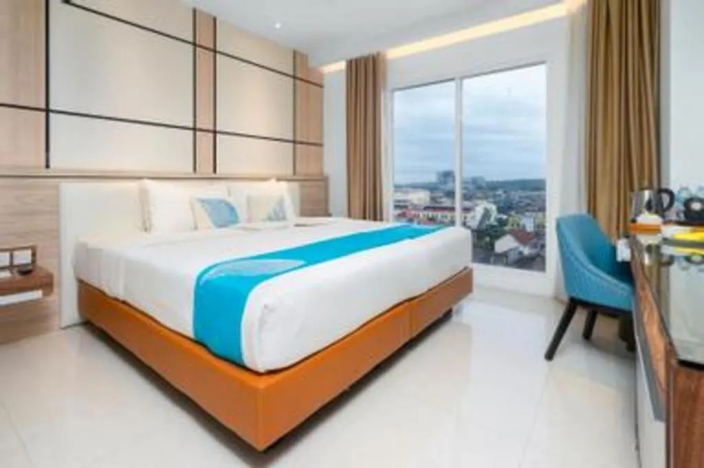 Bed in Java Lotus Hotel Jember