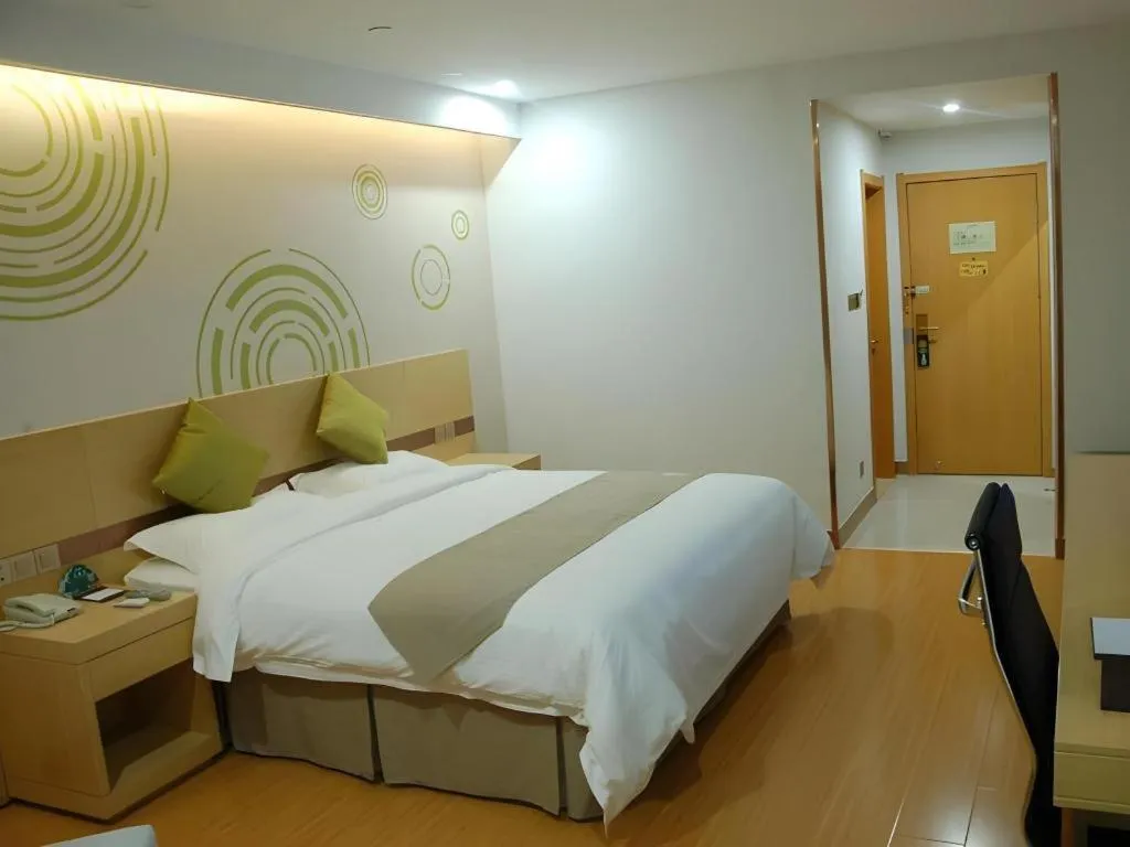 Bed in GreenTree Inn Anqing Wangjiang County Lantian Road Yiheyuan Express Hotel