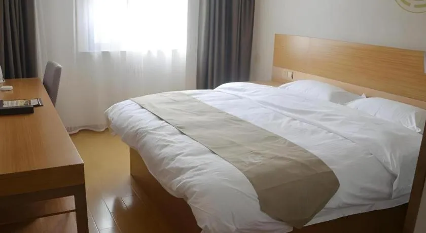 Bed in GreenTree Inn Anqing Wangjiang County Lantian Road Yiheyuan Express Hotel