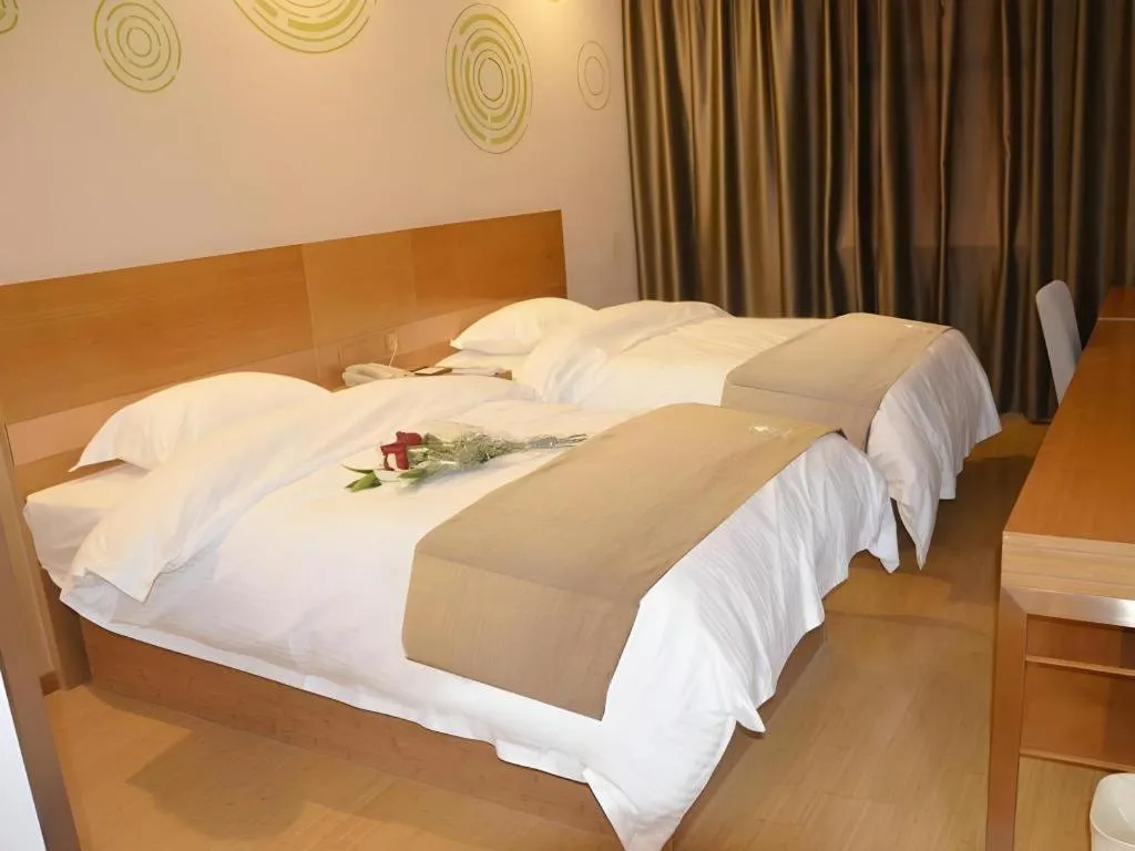 Bed in GreenTree Inn Anqing Wangjiang County Lantian Road Yiheyuan Express Hotel