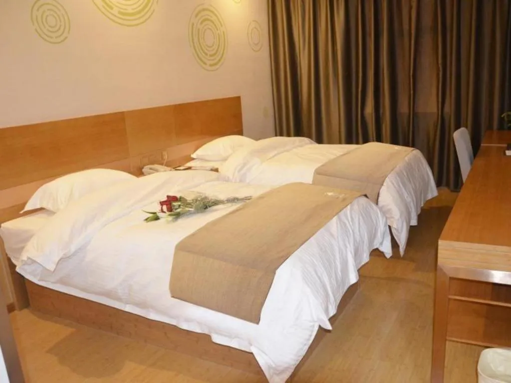 Bed in GreenTree Inn Anqing Wangjiang County Lantian Road Yiheyuan Express Hotel