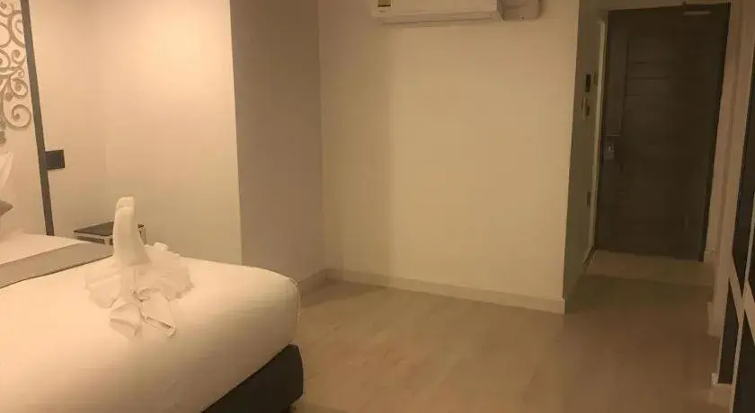 Bed in white house Bed in white house