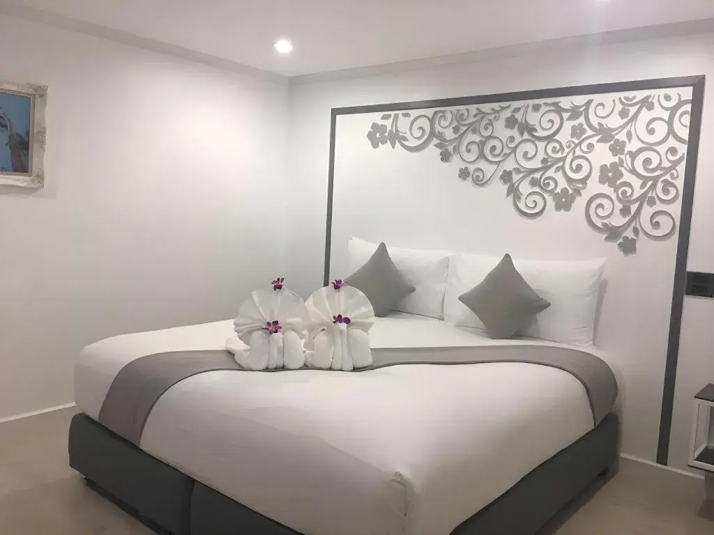 Bed in white house Bed in white house