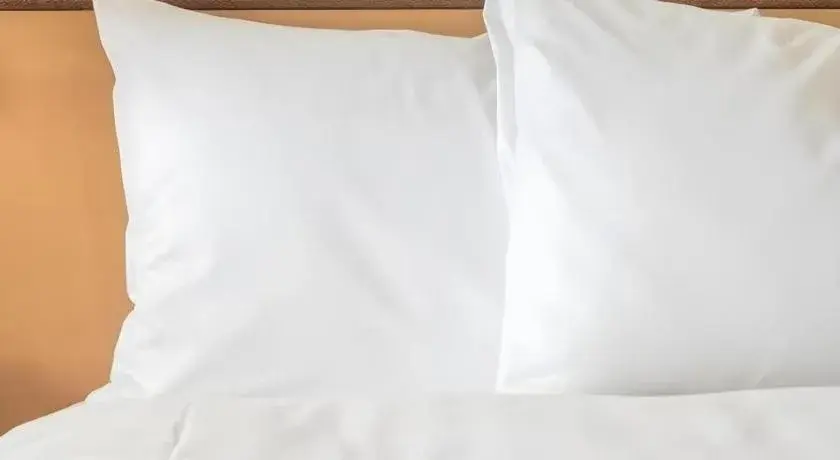 Bed in white house Bed in white house