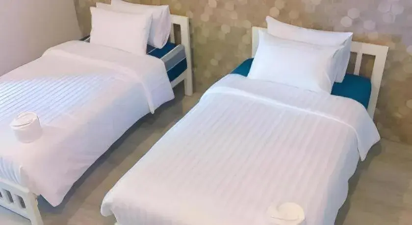 Bed in Kosit One Hotel Bed in Kosit One Hotel