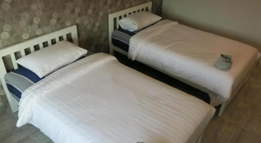 Bed in Kosit One Hotel