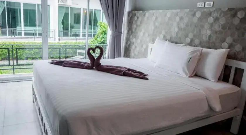 Bed in Kosit One Hotel Bed in Kosit One Hotel