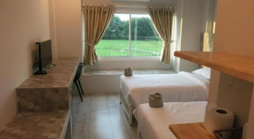 Bed in Kosit One Hotel