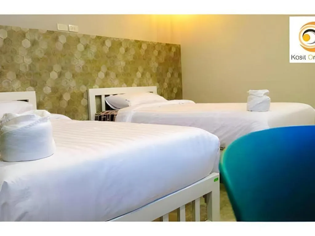 Bed in Kosit One Hotel