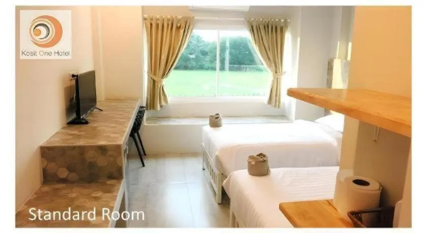 Bed in Kosit One Hotel