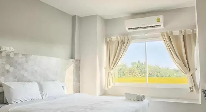 Bed in Kosit One Hotel Bed in Kosit One Hotel