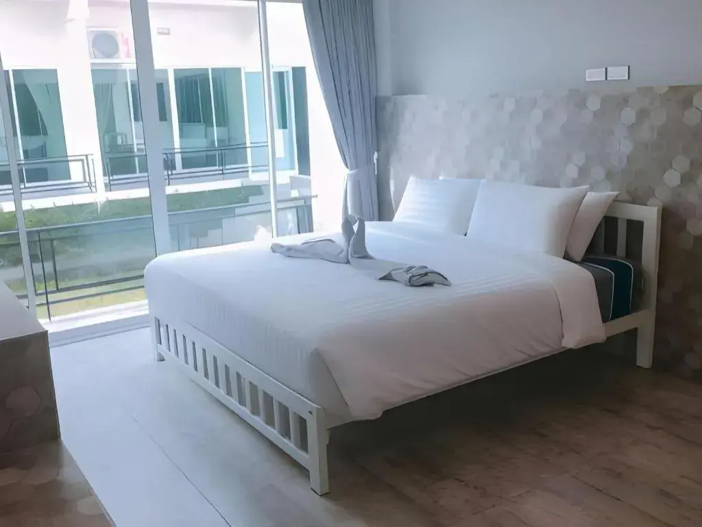 Bed in Kosit One Hotel Bed in Kosit One Hotel