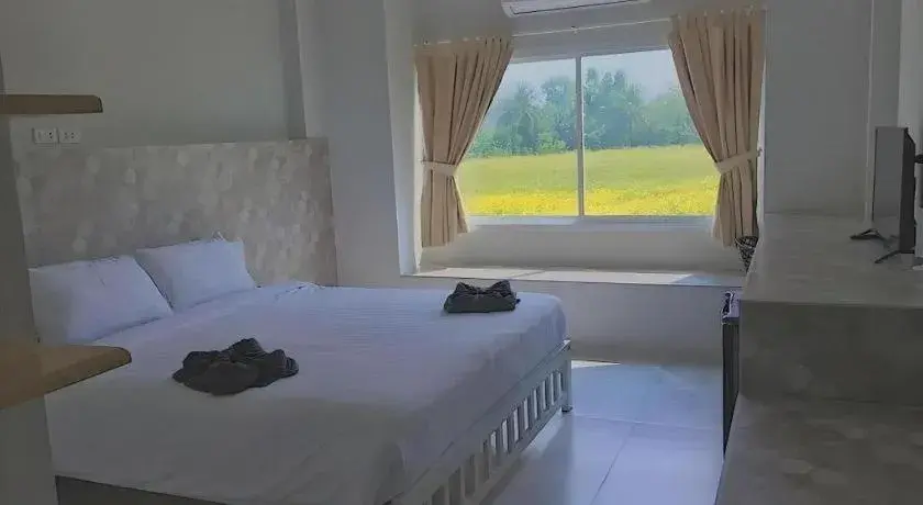 Bed in Kosit One Hotel Bed in Kosit One Hotel