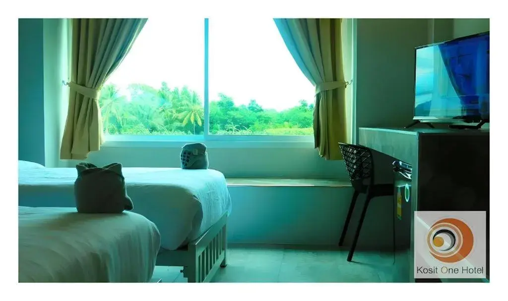 Bed in Kosit One Hotel Bed in Kosit One Hotel