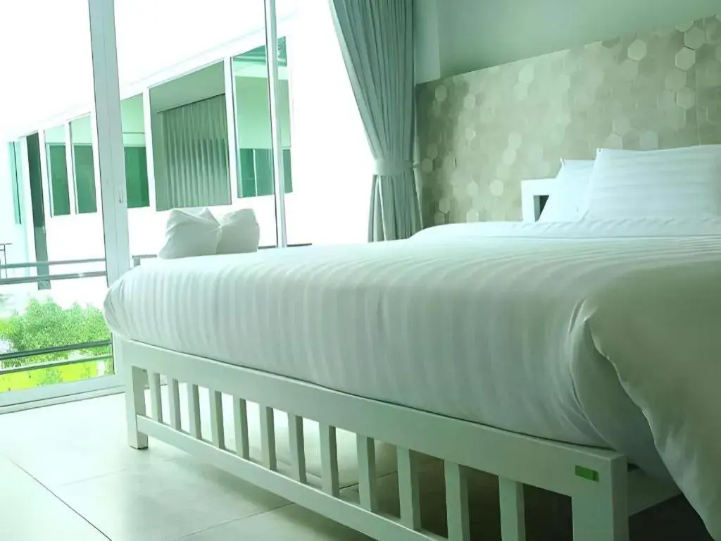 Bed in Kosit One Hotel Bed in Kosit One Hotel