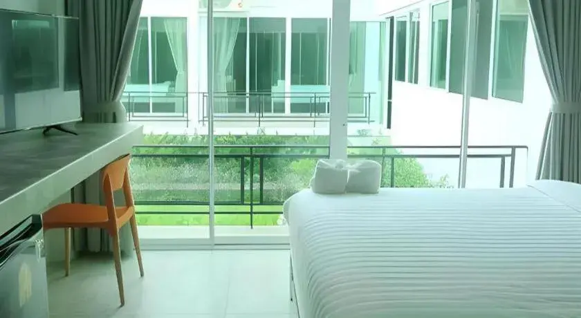 Bed in Kosit One Hotel Bed in Kosit One Hotel