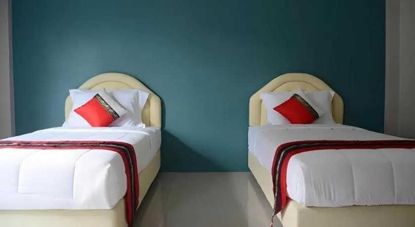 Bed in Satun Boutique Resort