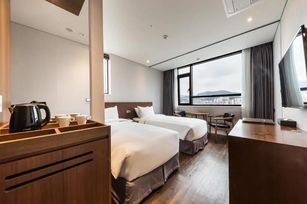 Bed in CS Premier Hotel