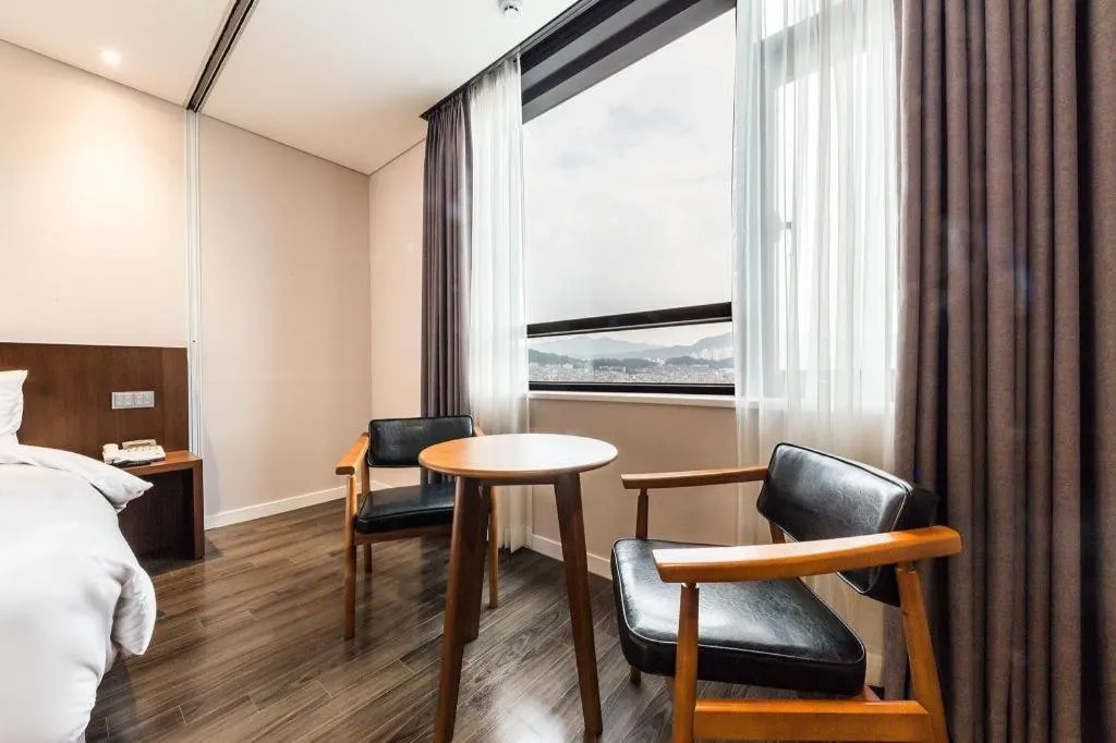 Bed in CS Premier Hotel