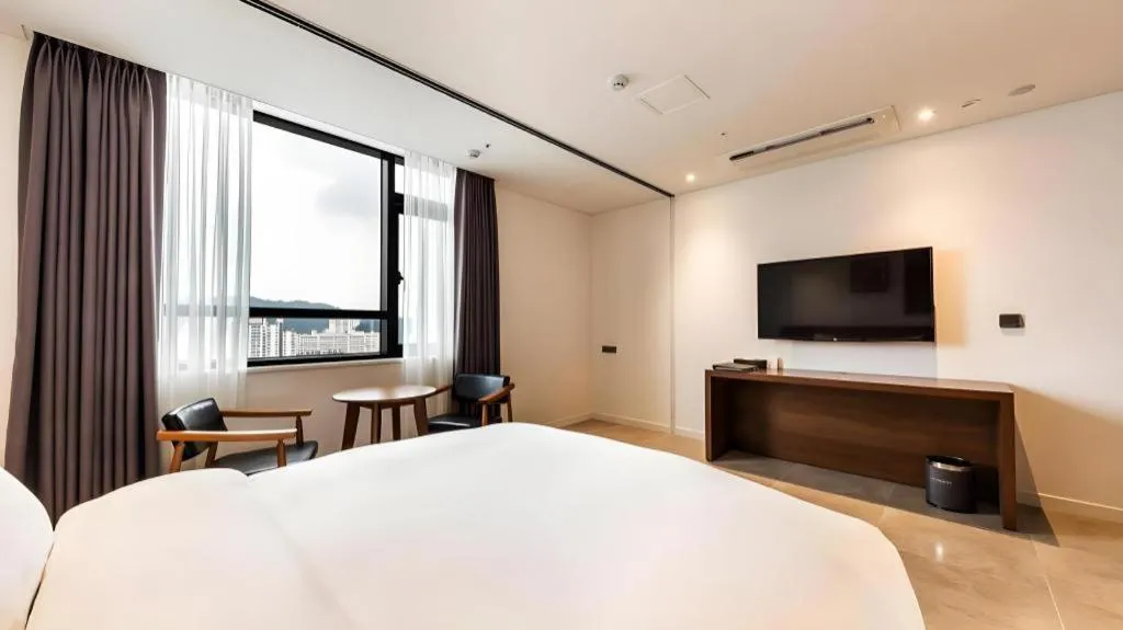 Bed in CS Premier Hotel